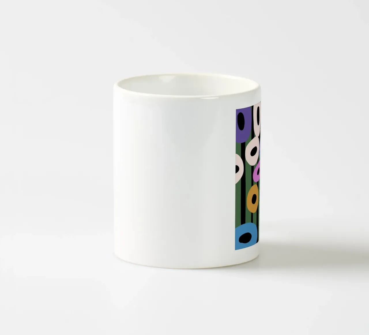 Fiori di ciambella colorati tazza in ceramica da Little Dean