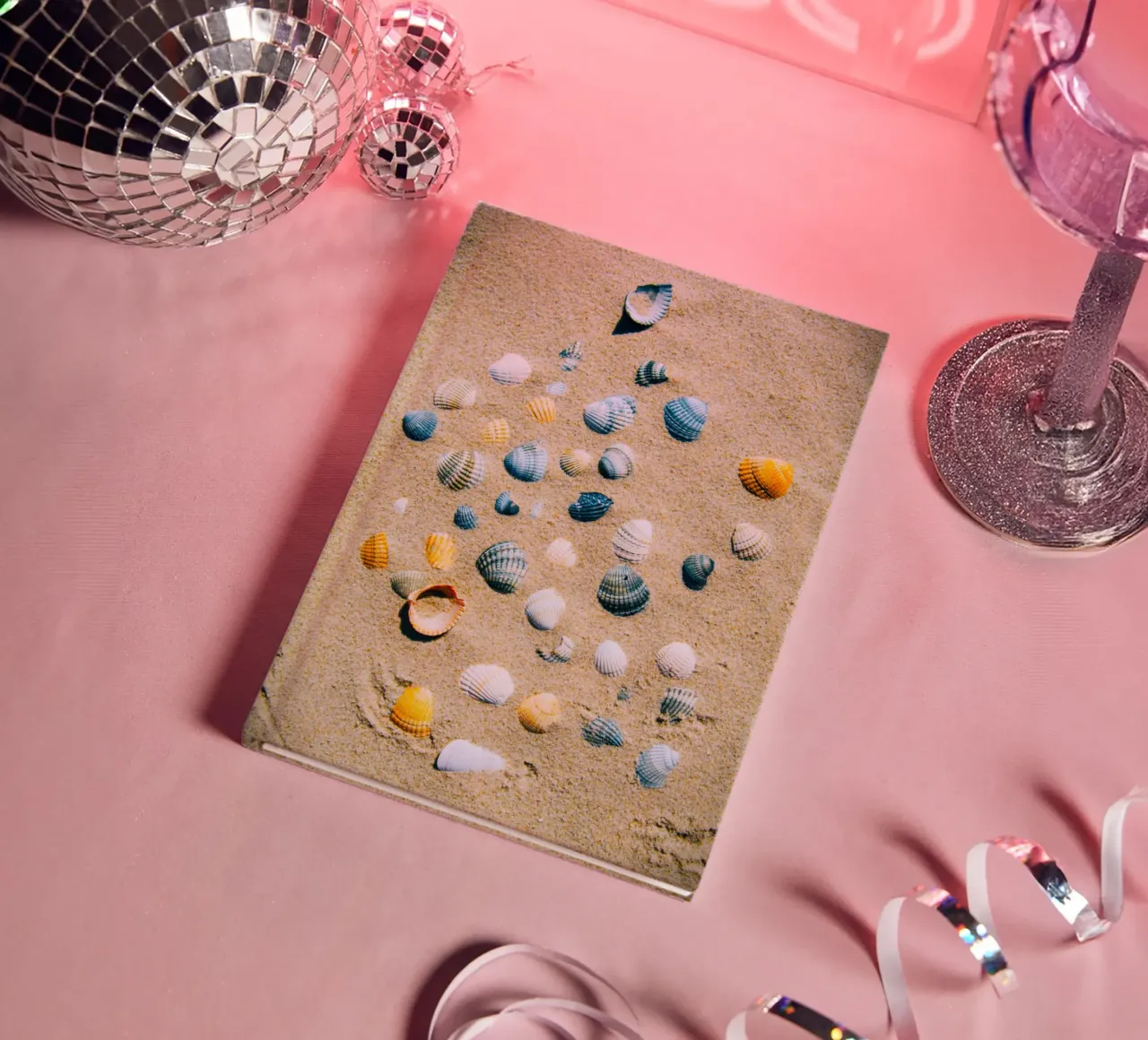 Shells on the sand – the ocean's eternal mark notebook by Nature's Palette