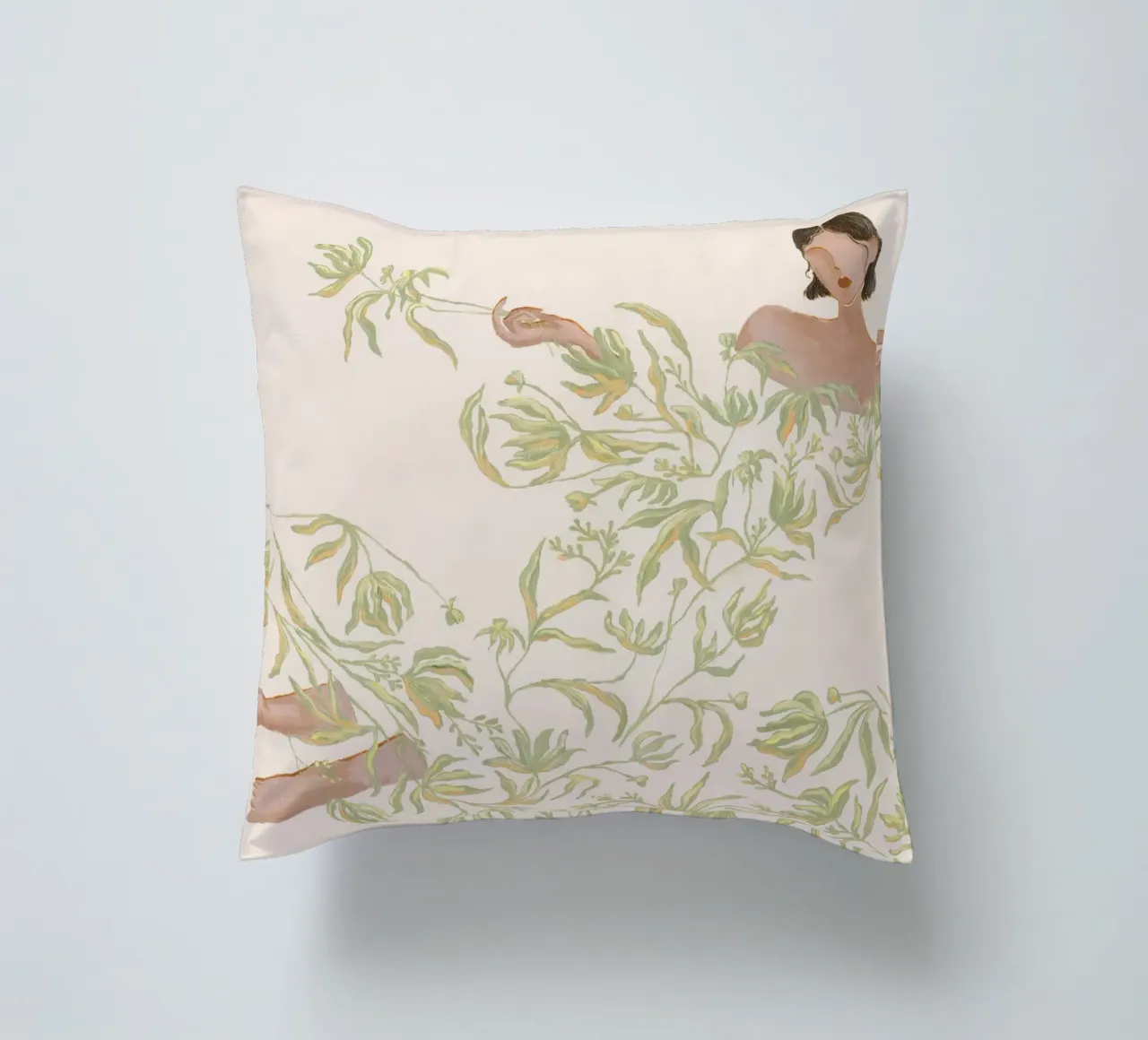 Signora in abito floreale verde cuscino da Morgan shop