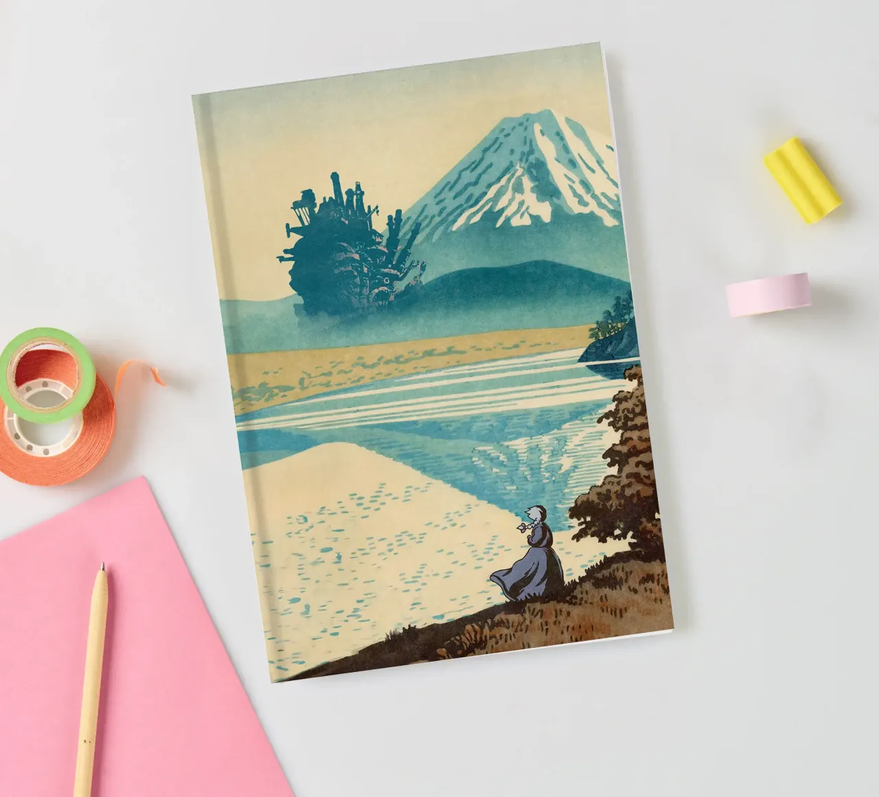 Blue fuji Over the Clouds and Moving Castle notebook by Junior Harrington