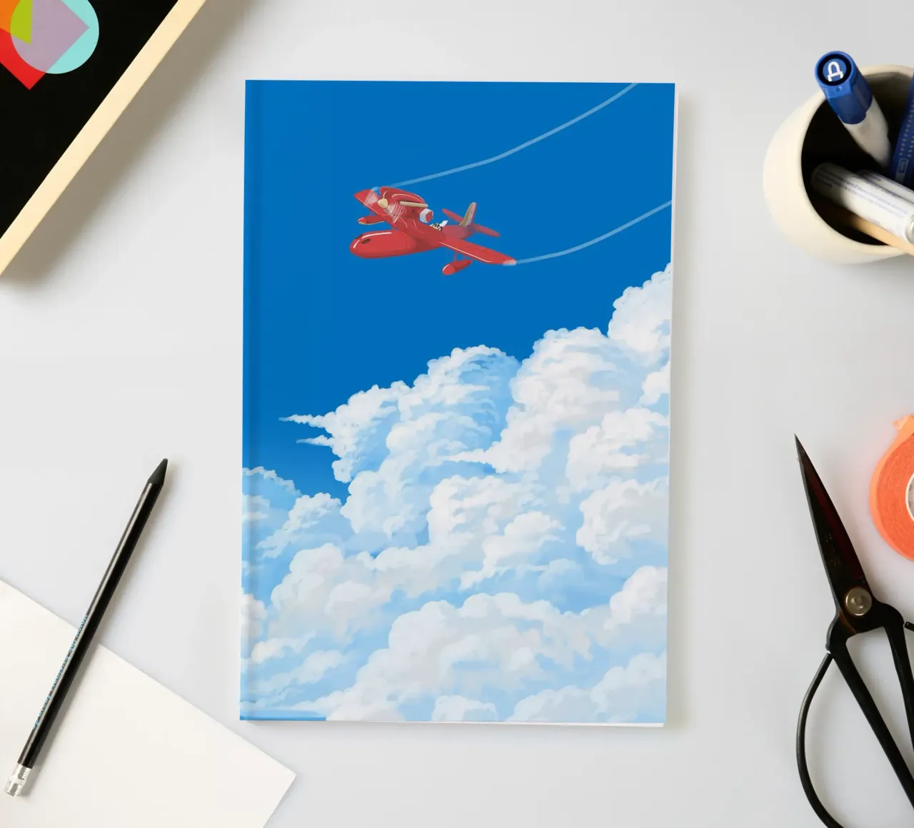 Flying over clouds notebook by Junior Harrington