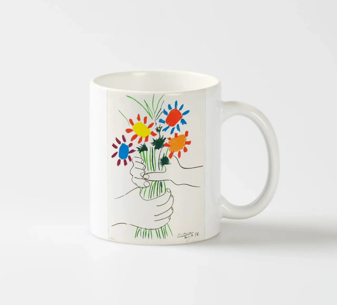 due mani che tengono un fiore di Picasso tazza in ceramica da eternal nino