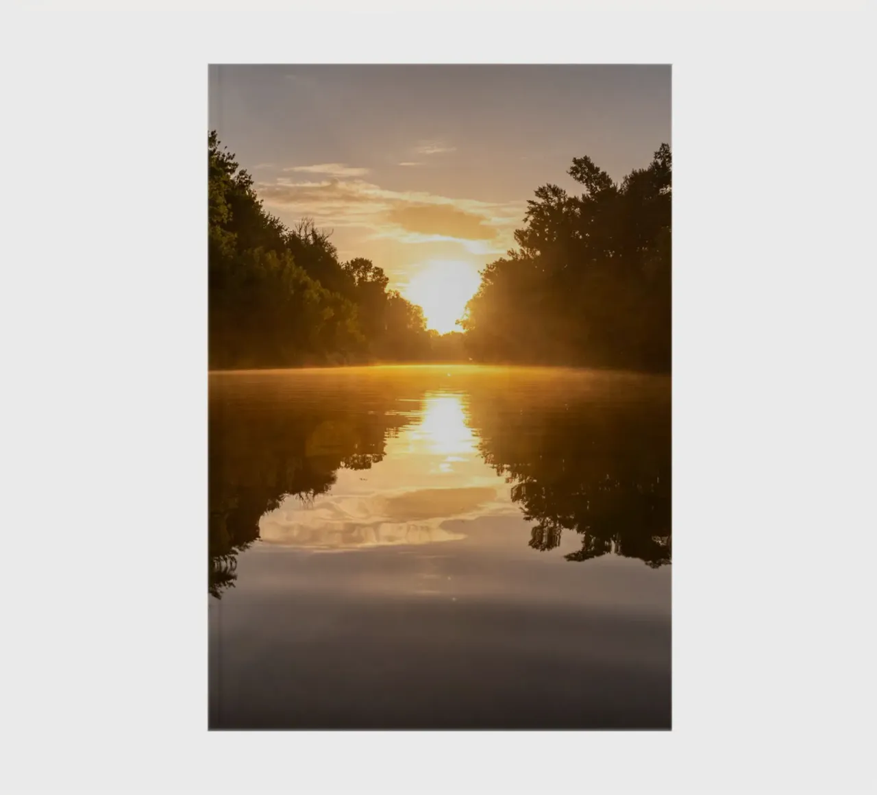 Sunset reflecting on a river notebook by anderm