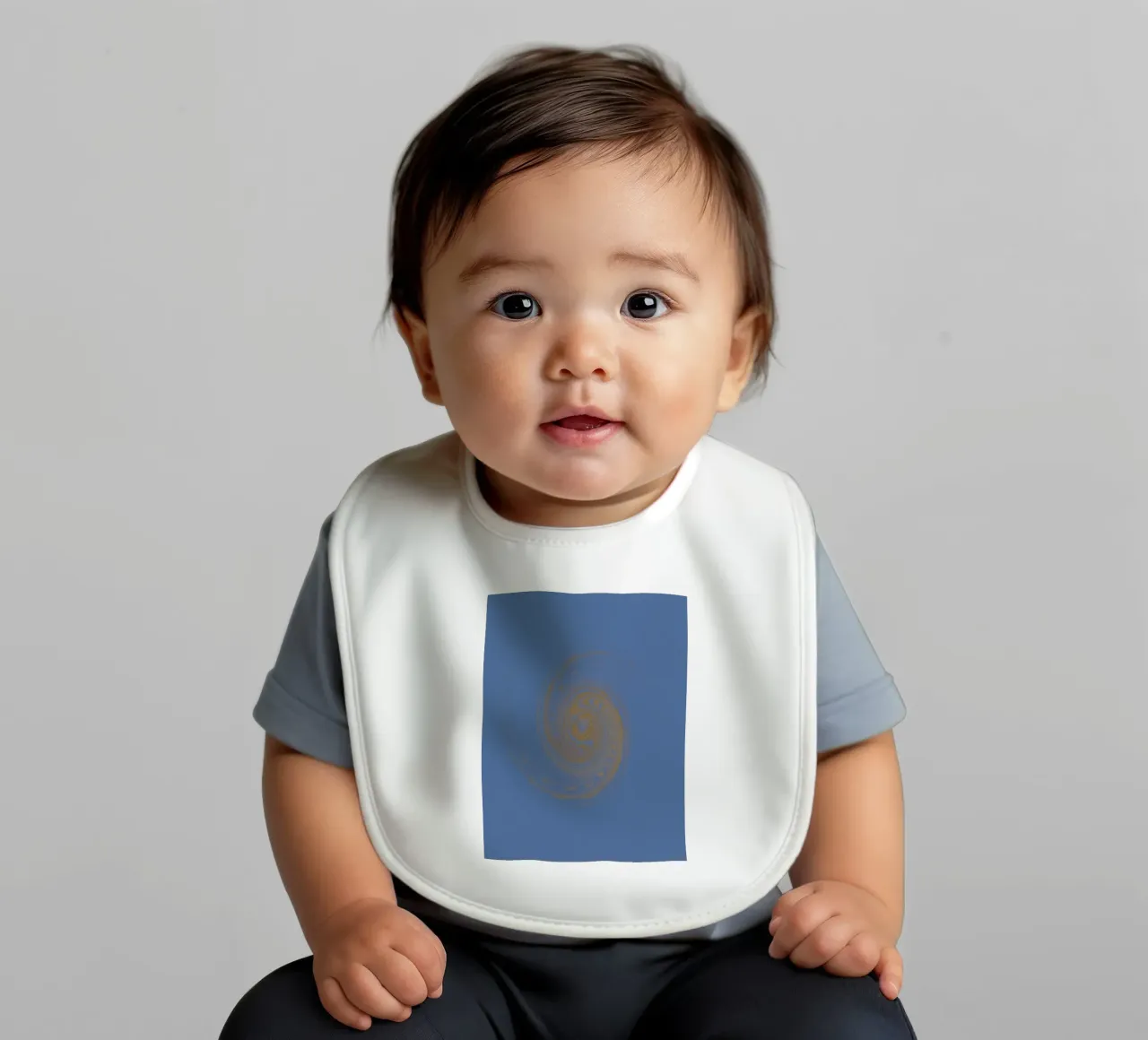 Abstract dynamic circular pattern in yellow and blue baby bib by Something for you