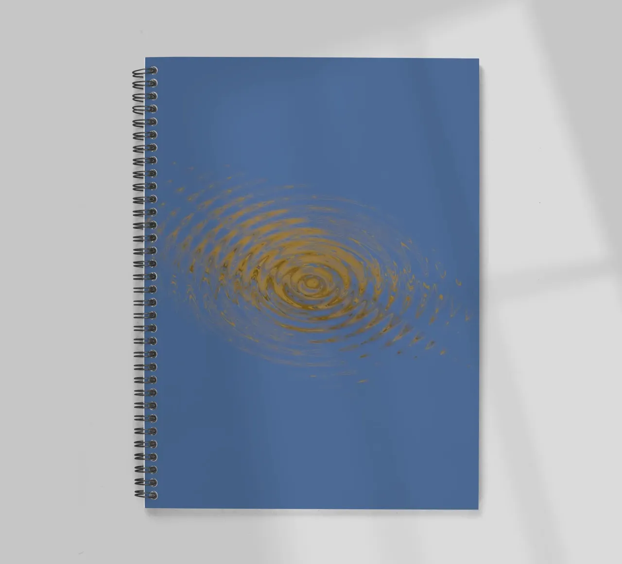 Abstract dynamic circular pattern in blue and yellow spiral notebook by Something for you