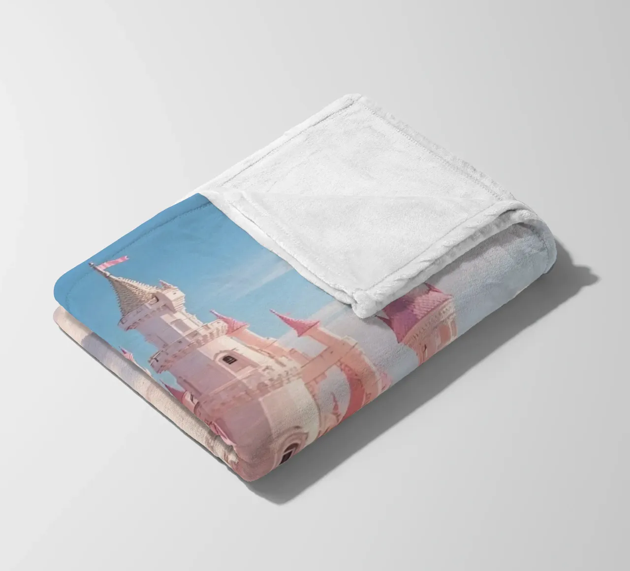 Castle floating on clouds with rainbow fleece blanket by DesignDoodle
