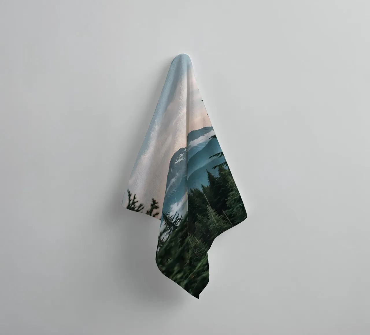 Coniferous Forest Framing Snow-Capped Mountain Peak towel by DesignDoodle