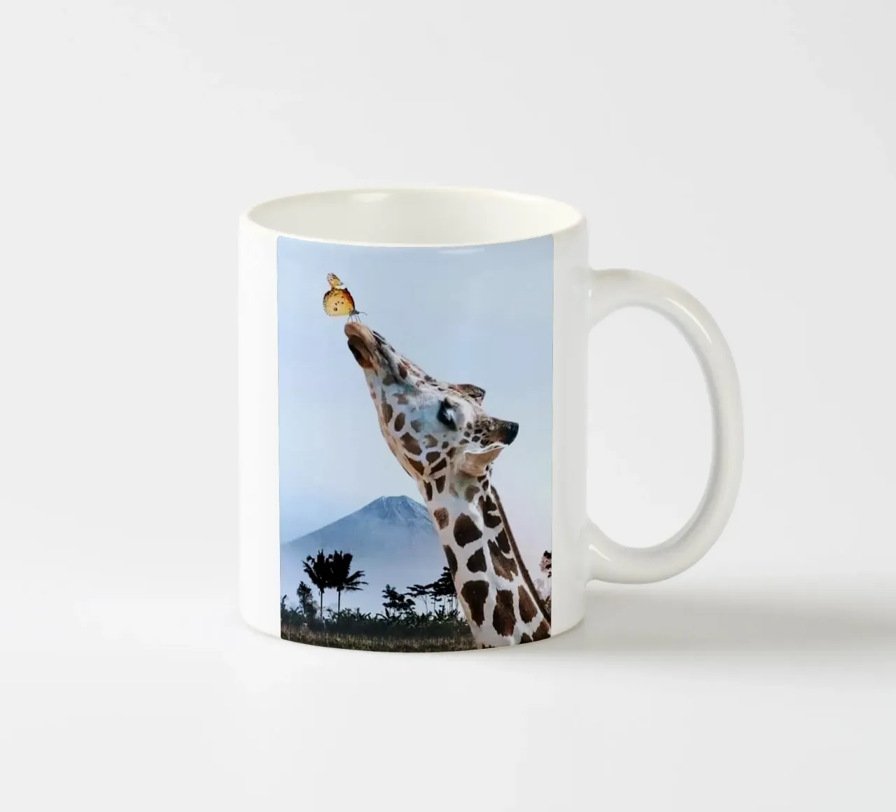 giraffe and butterfly tazza in ceramica da ryan