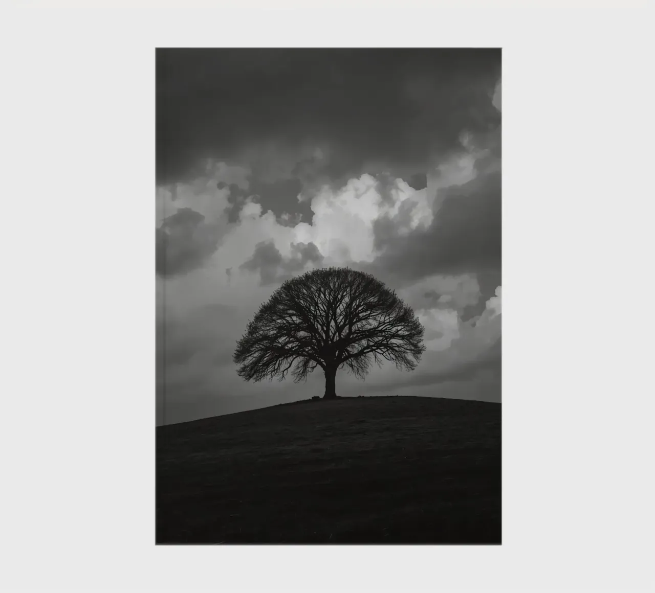 Deciduous Tree on Grassy Hill Under Cloudy Sky notebook by DesignDoodle