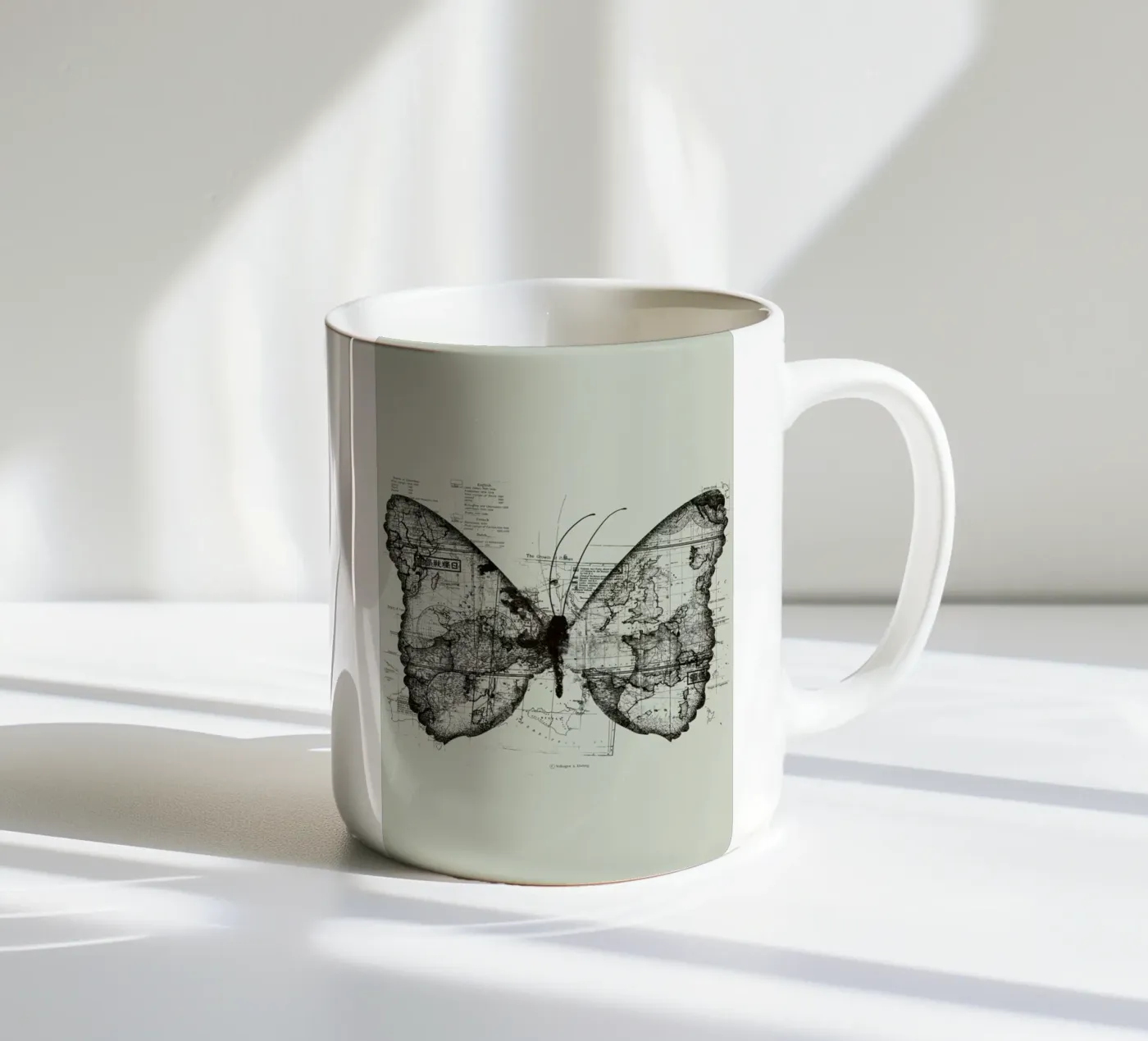 Butterfly effect ceramic mug by Tobe Fonseca