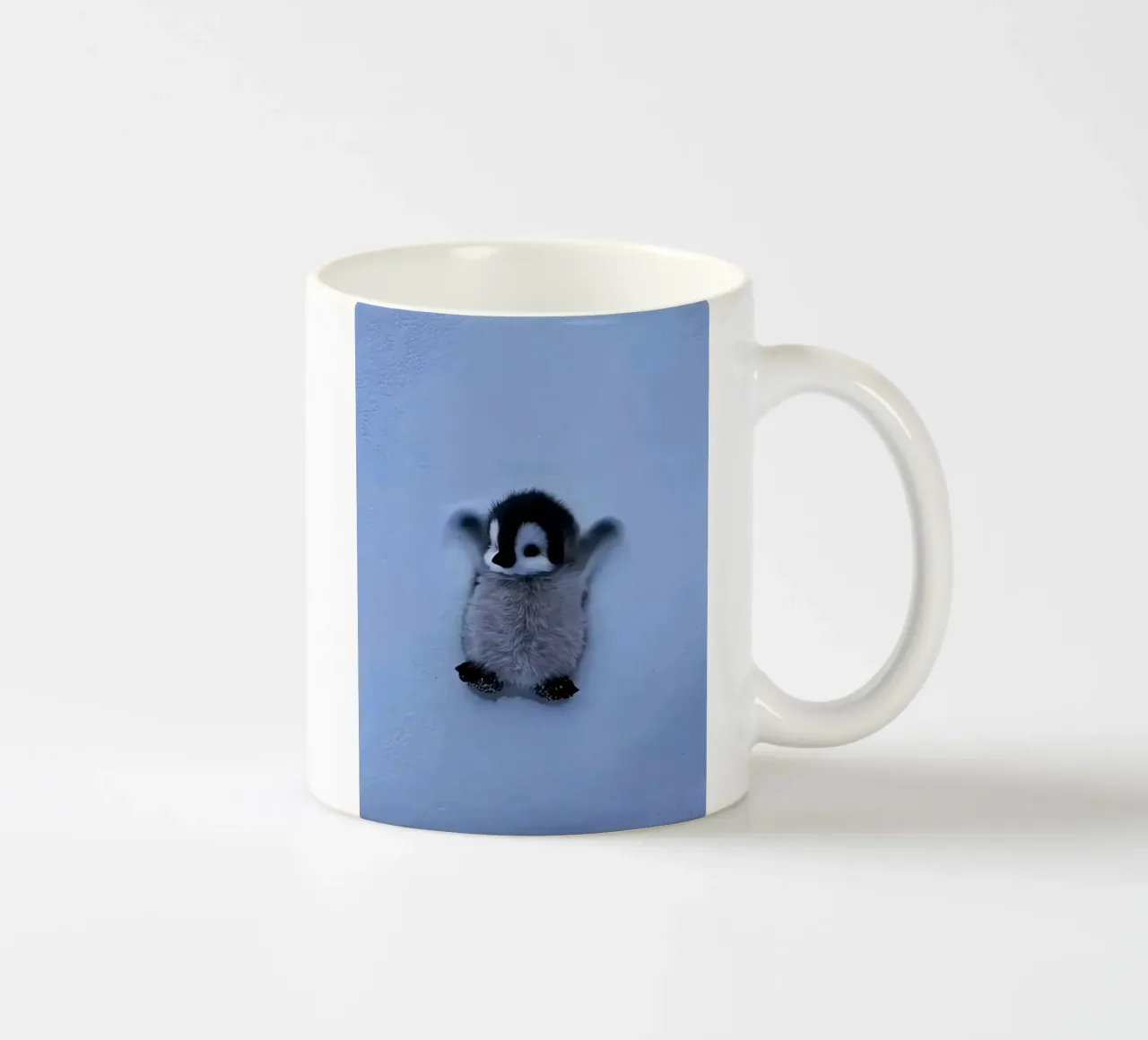 penguin on snow tazza in ceramica da ryan