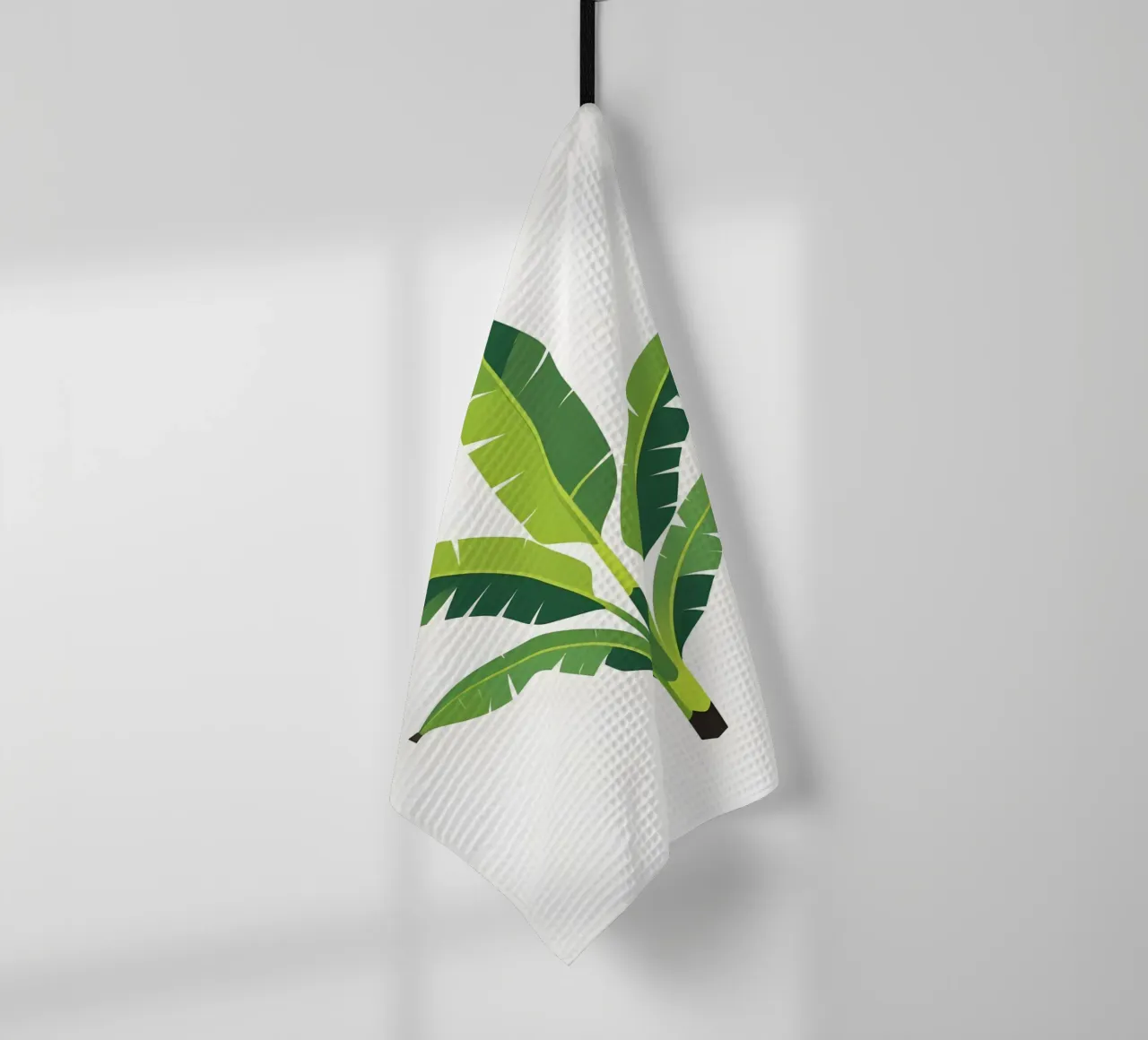 Section of banana leaf shape tea towel by Botanical Gallery