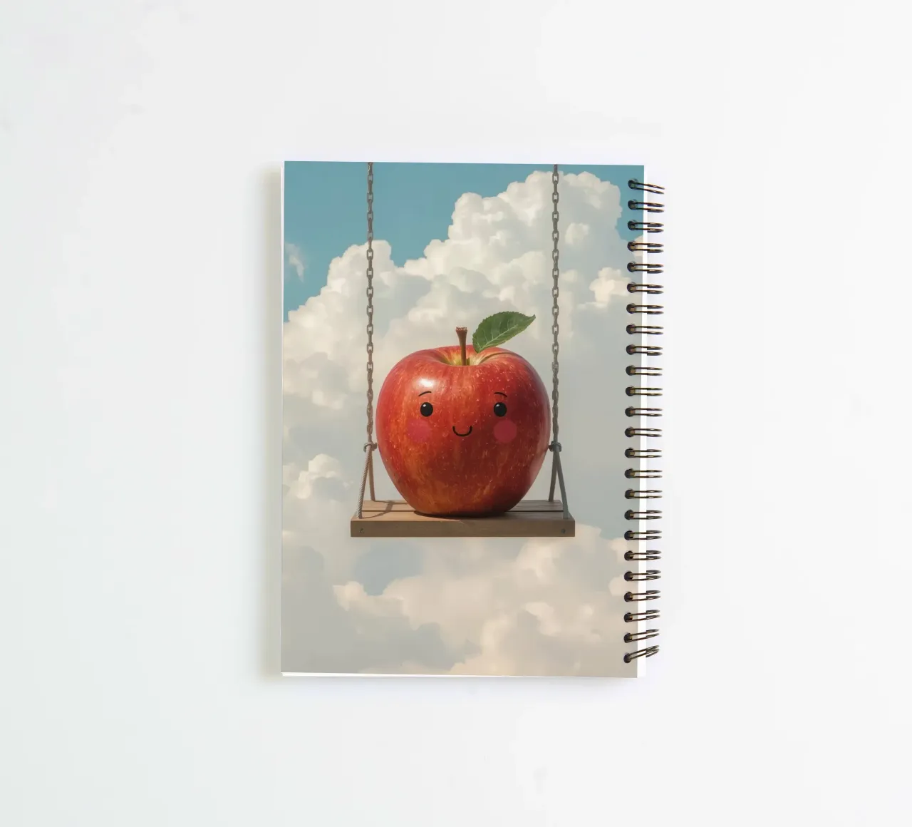Cute Red Apple on a Swing in the Clouds spiral notebook by DesignDoodle
