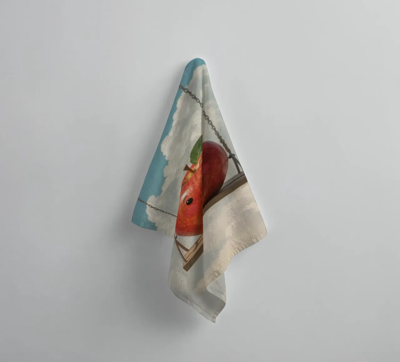 Cute Red Apple on a Swing in the Clouds towel by DesignDoodle