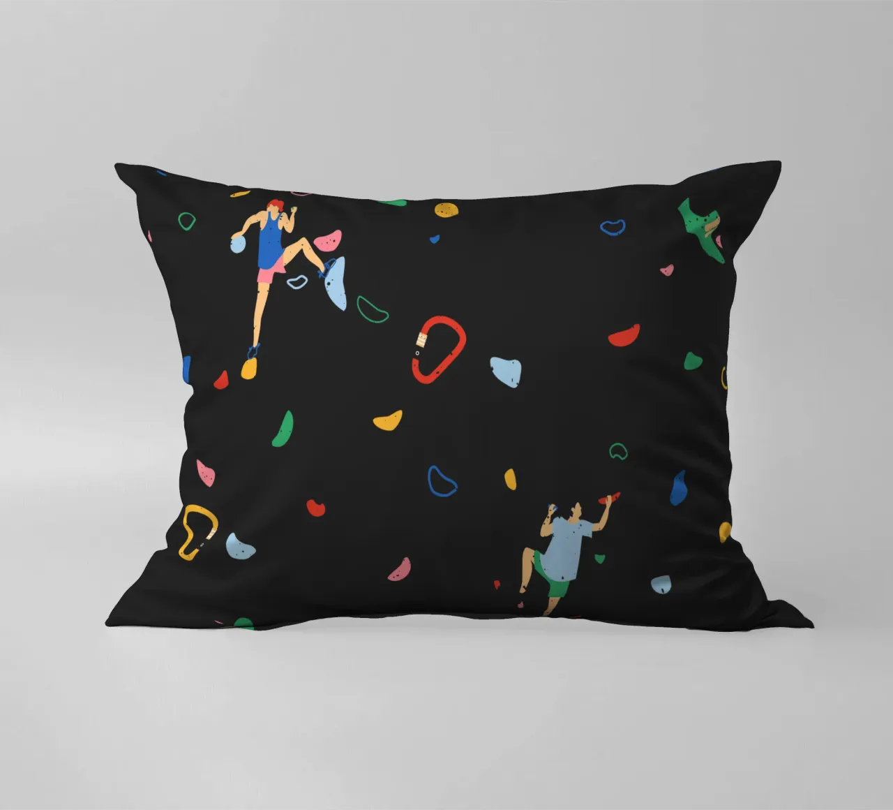 Arrampicatore su una parete di bouldering cuscino da justclimberthings
