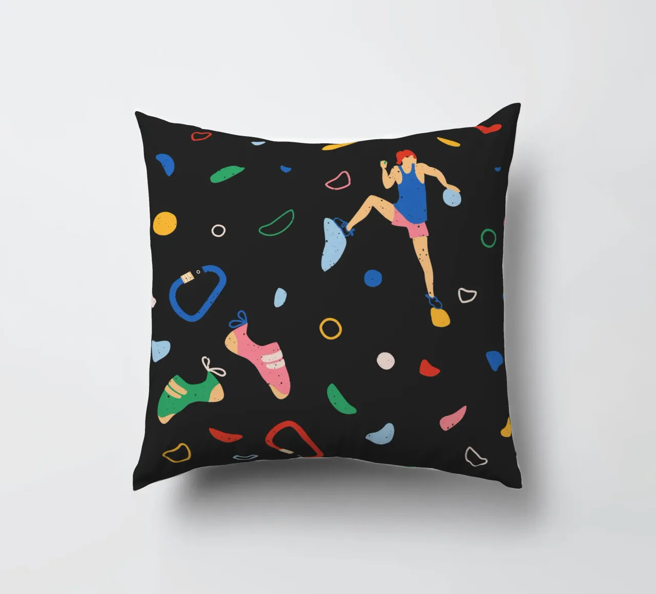 Arrampicatore su una parete di bouldering cuscino da justclimberthings