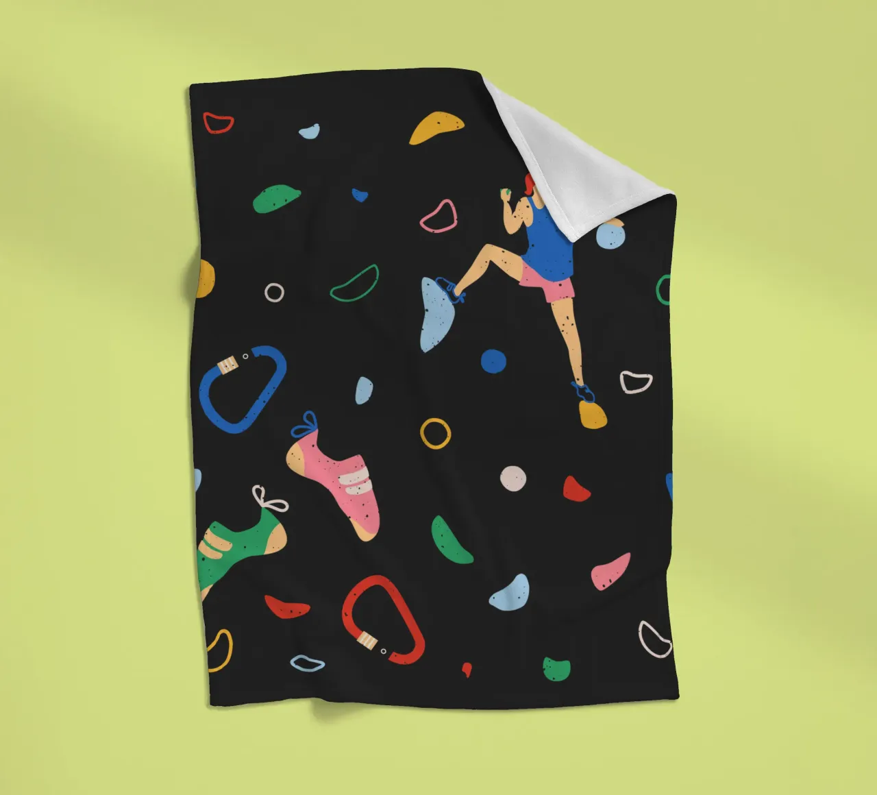 Arrampicatore su una parete di bouldering coperta in pile da justclimberthings