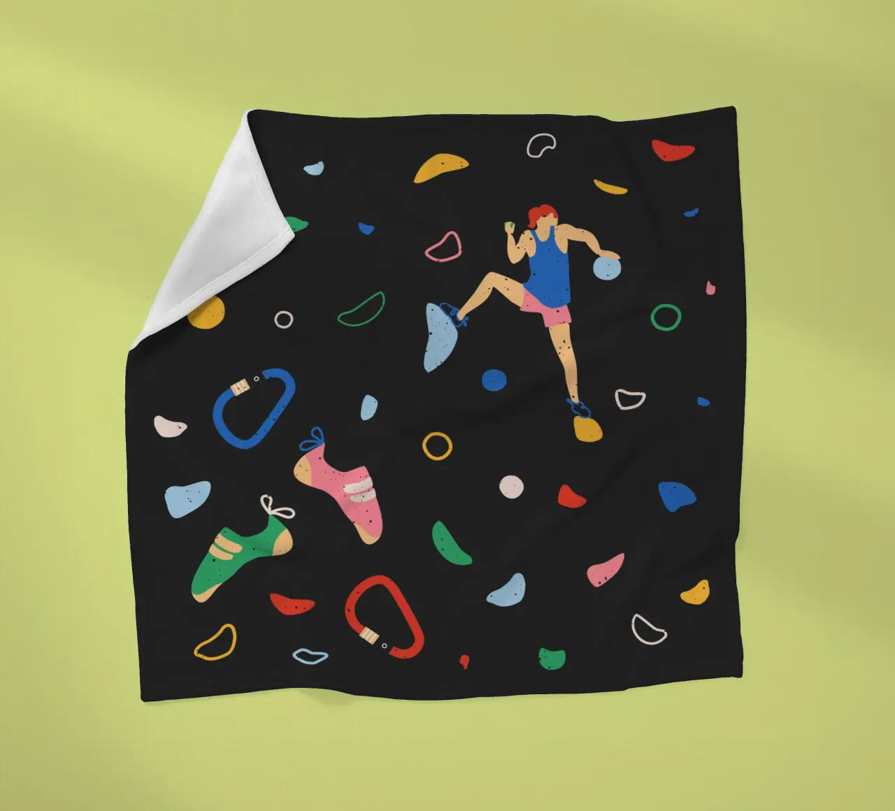 Arrampicatore su una parete di bouldering coperta in pile da justclimberthings
