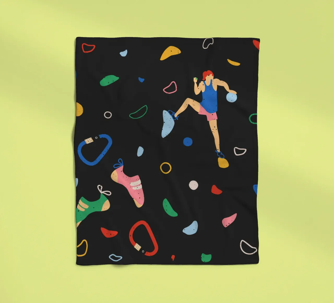 Arrampicatore su una parete di bouldering coperta in pile da justclimberthings