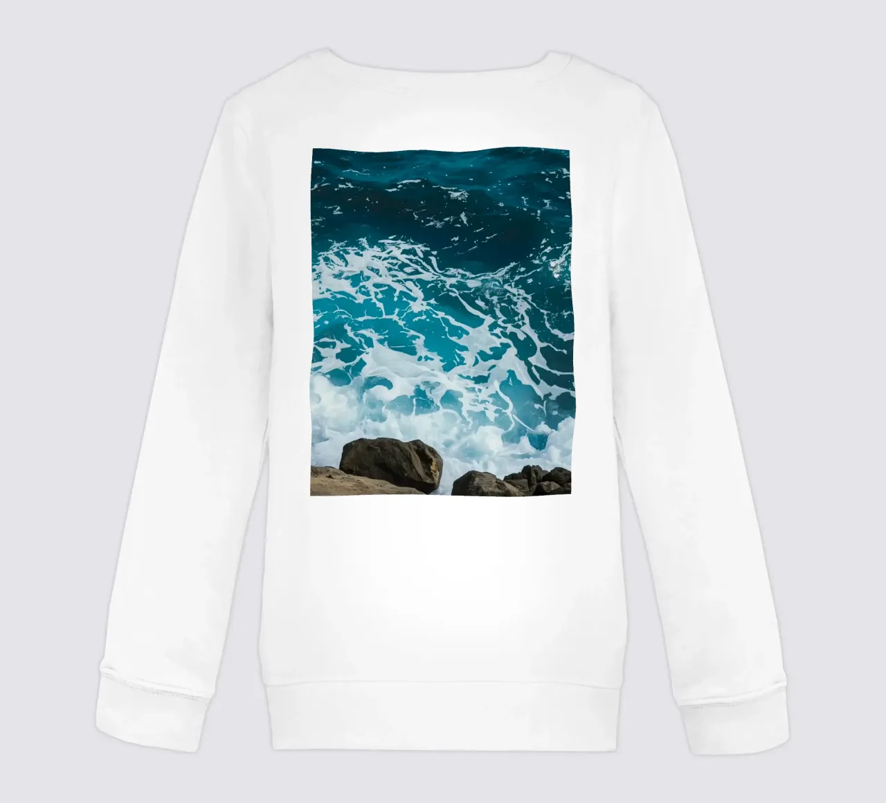 Onde oceaniche che si infrangono sulle rocce felpa bambino da DesignDoodle
