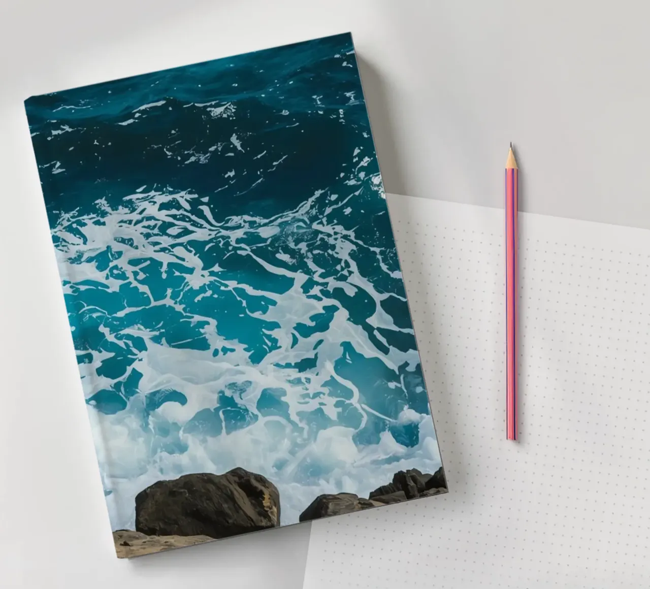 Ocean Waves Crashing on Rocks notebook by DesignDoodle