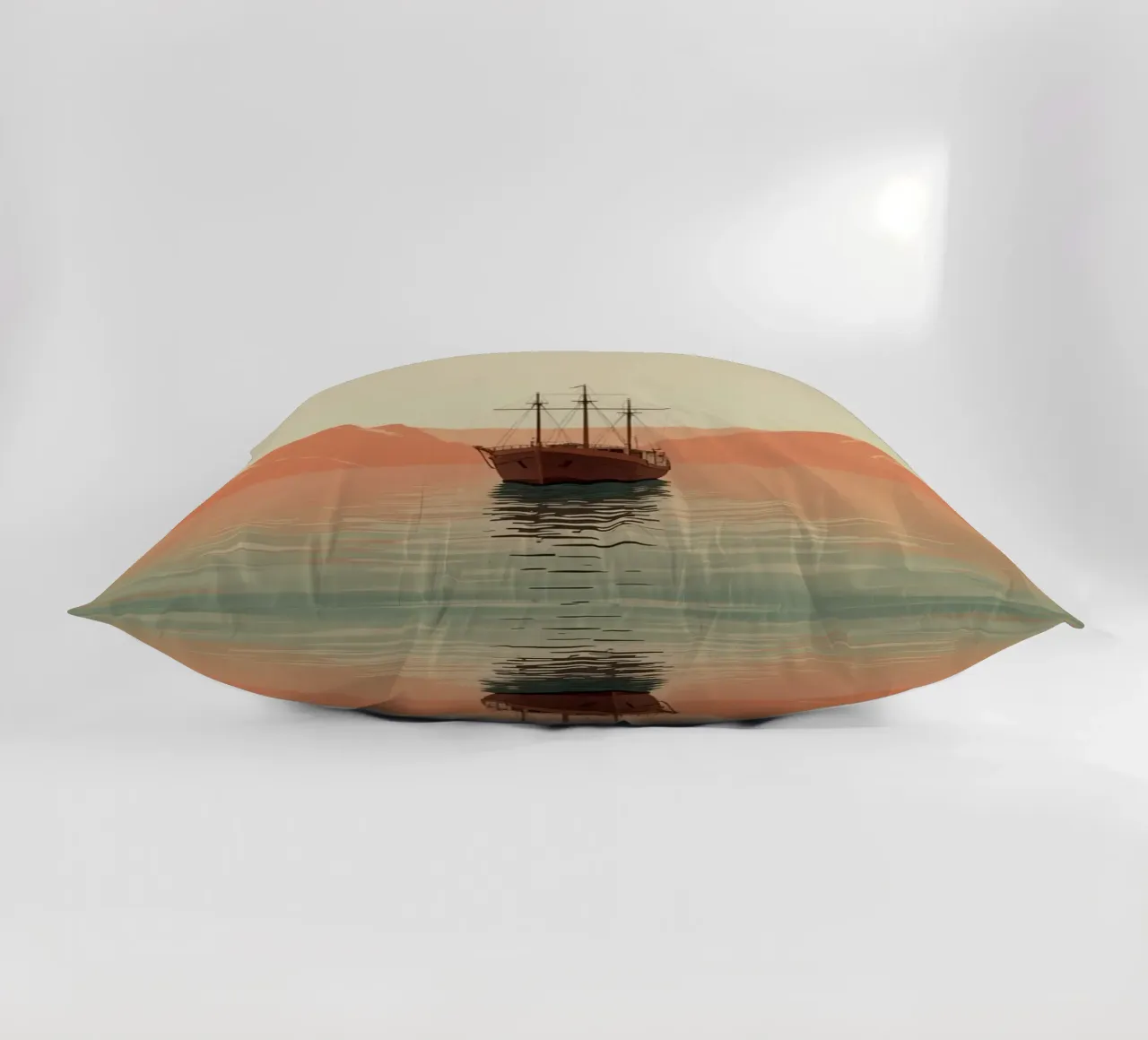 Nave a vela sull'acqua con montagne e cielo cuscino da DesignDoodle