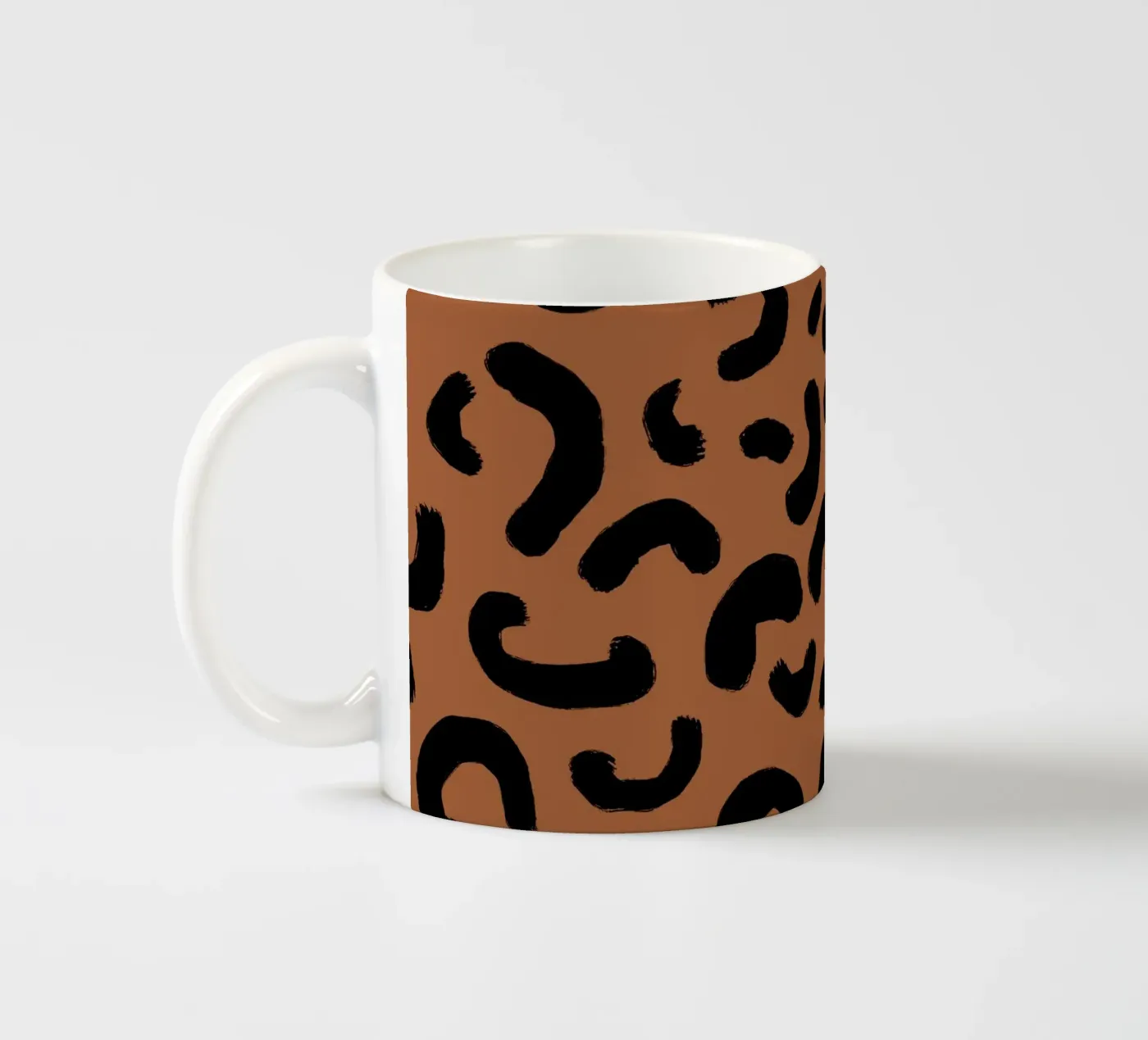 Leo Pattern ceramic mug by Studio ROSAGRAU