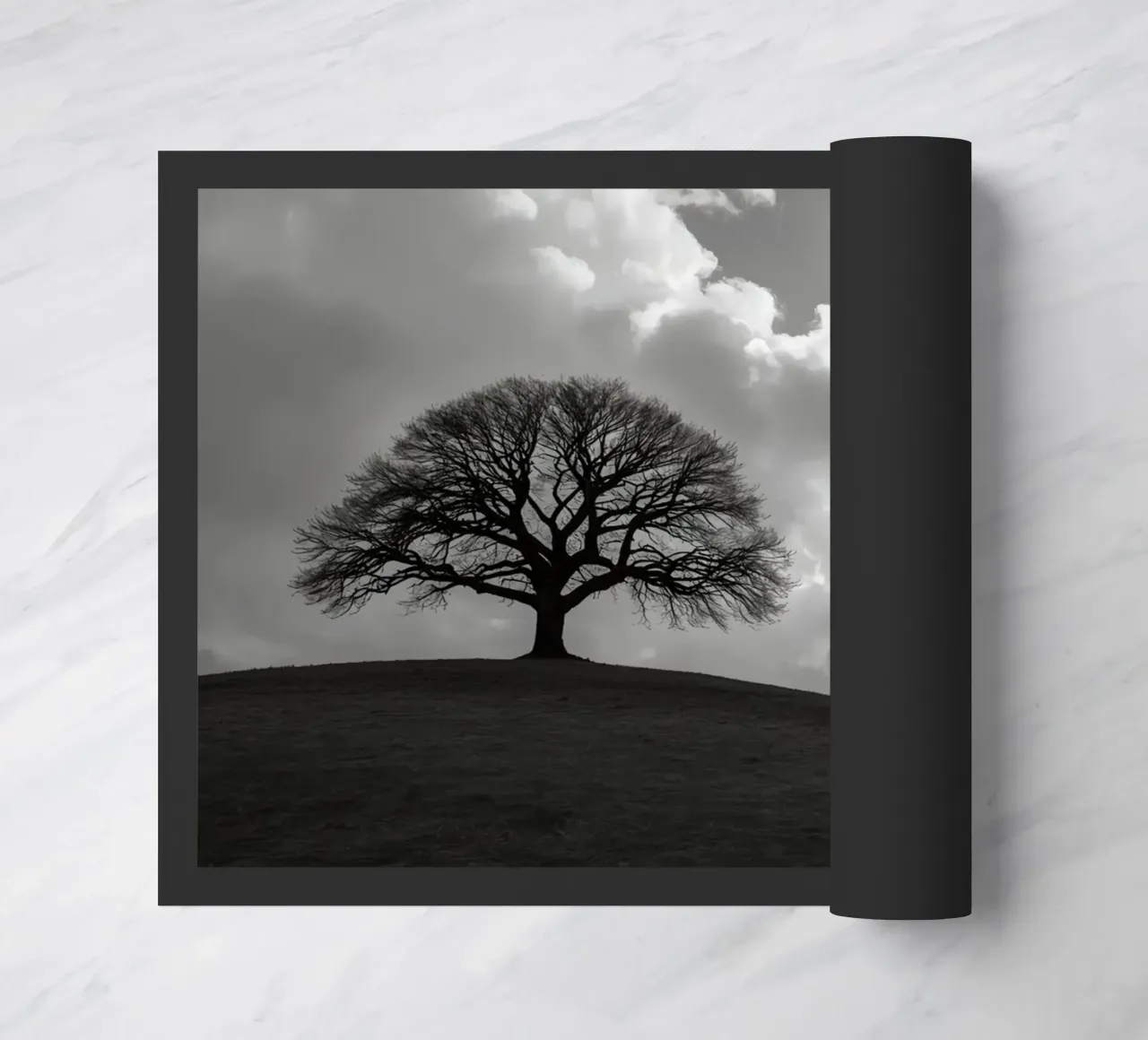 Silhouette of a bare tree on a hill against a cloudy sky doormat by DesignDoodle