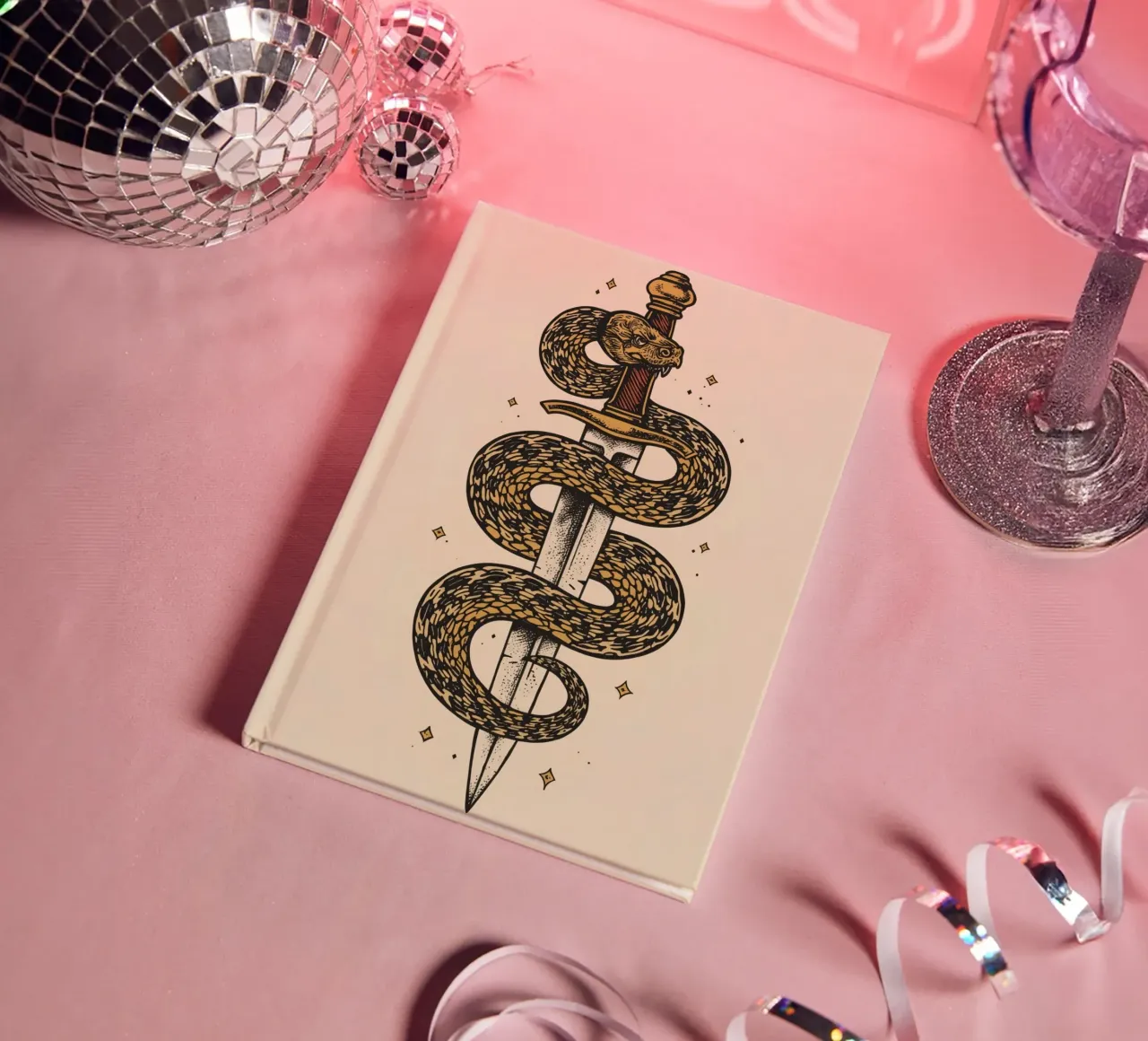 Snake Coiled Around Dagger notebook by DesignDoodle