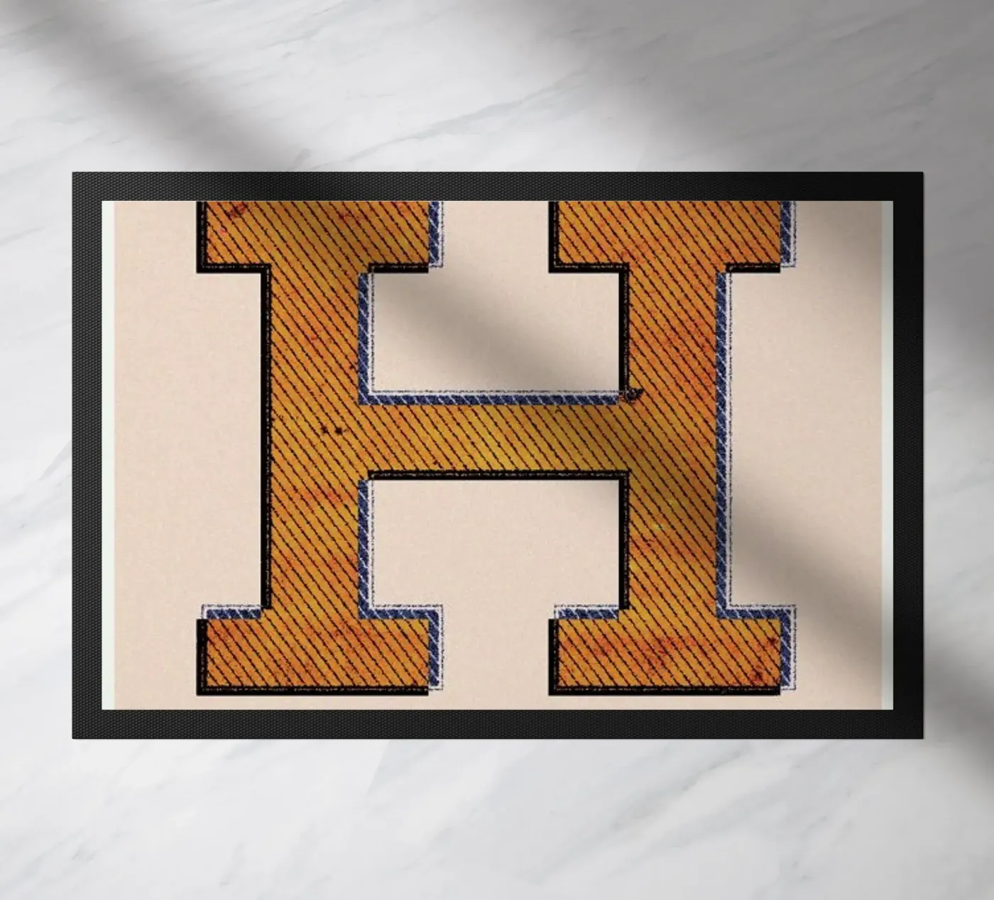 H doormat by Andreas Jarner