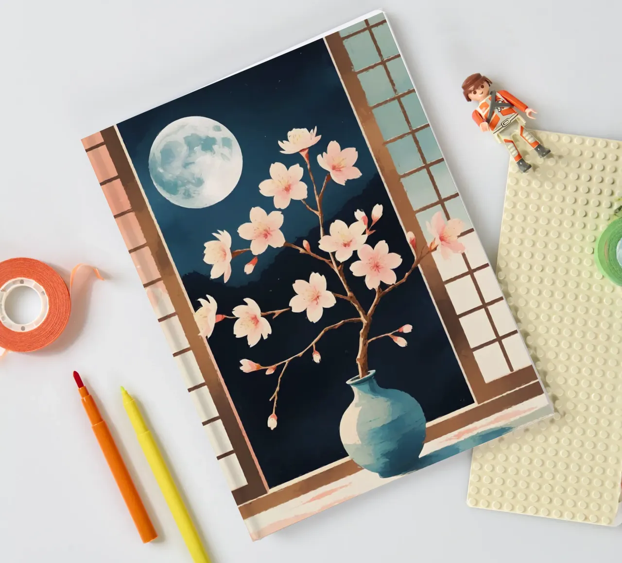 une branche de sakura en fleur dans un vase simple carnet de notes de Bloom And Brush