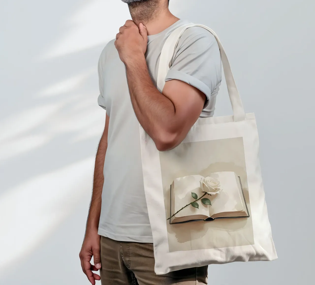 Un'illustrazione digitale minimalista di un libro aperto, con un si borsa in juta da Bloom And Brush