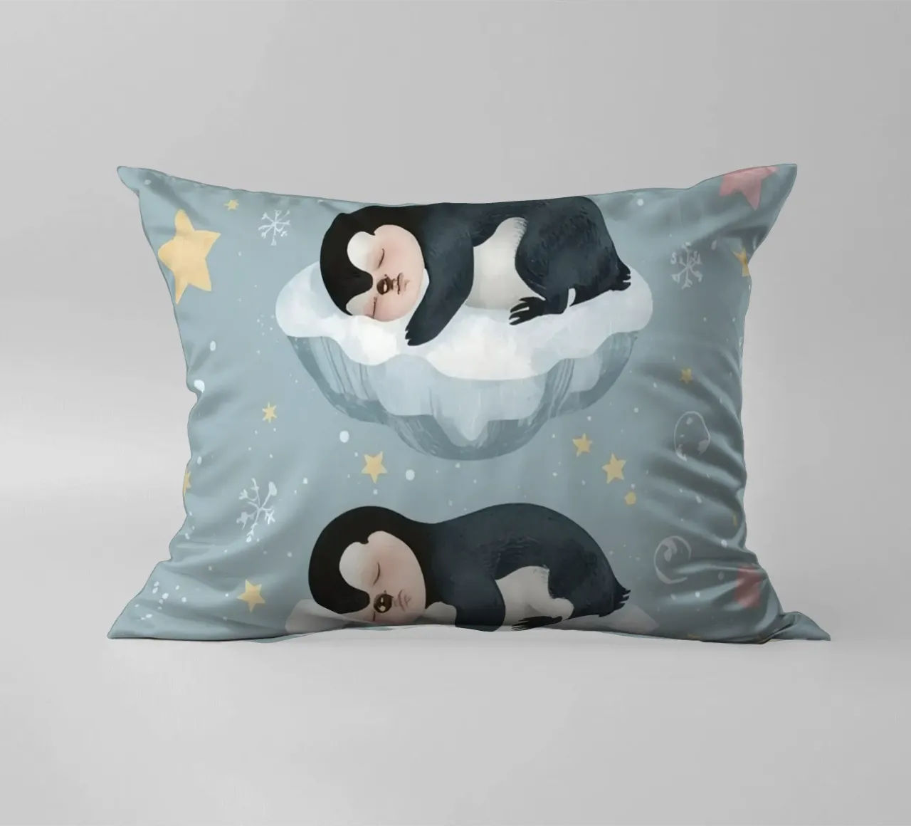 Due simpatici pinguini addormentati con elementi celestiali cuscino da DesignDoodle