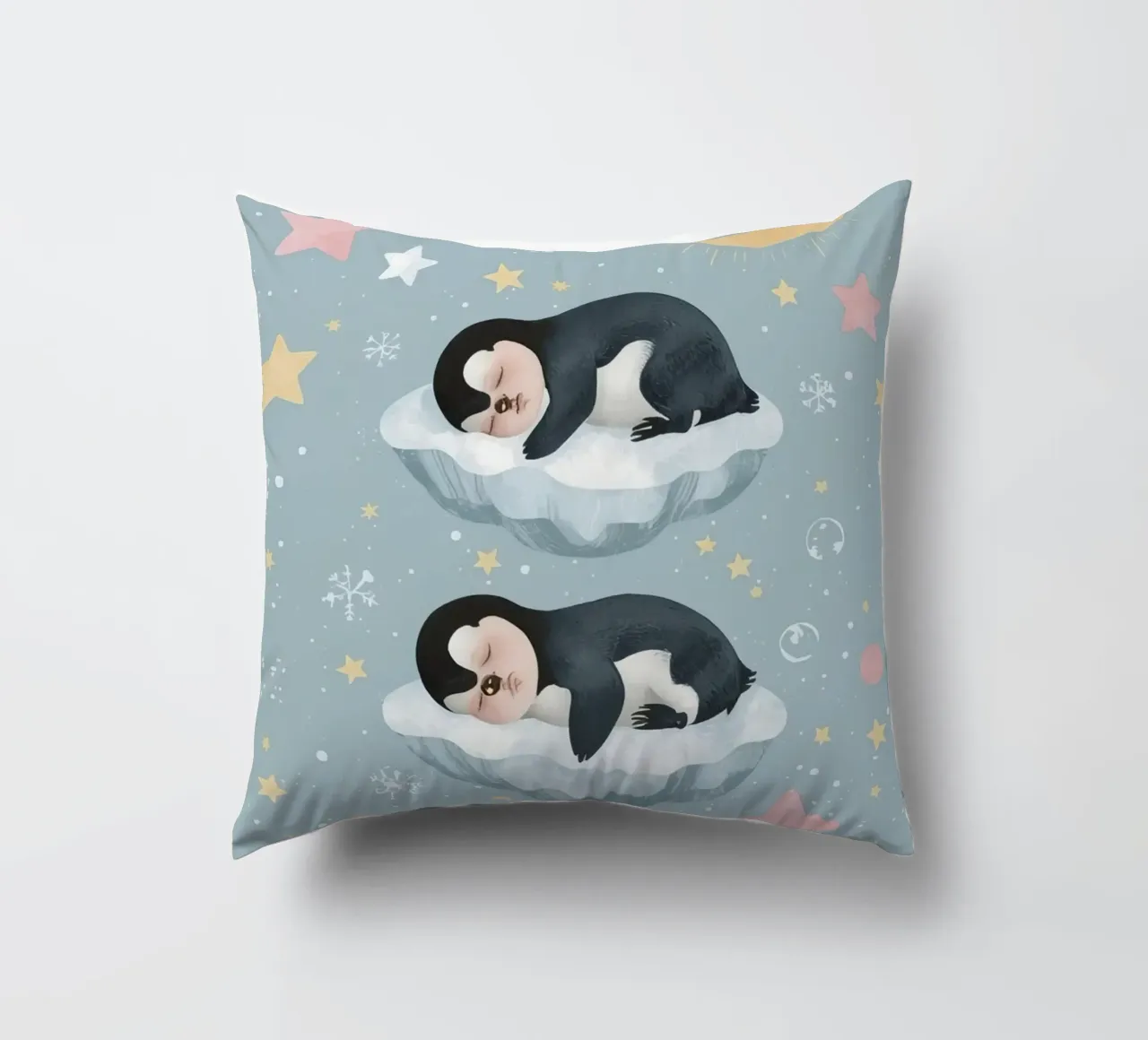 Due simpatici pinguini addormentati con elementi celestiali cuscino da DesignDoodle
