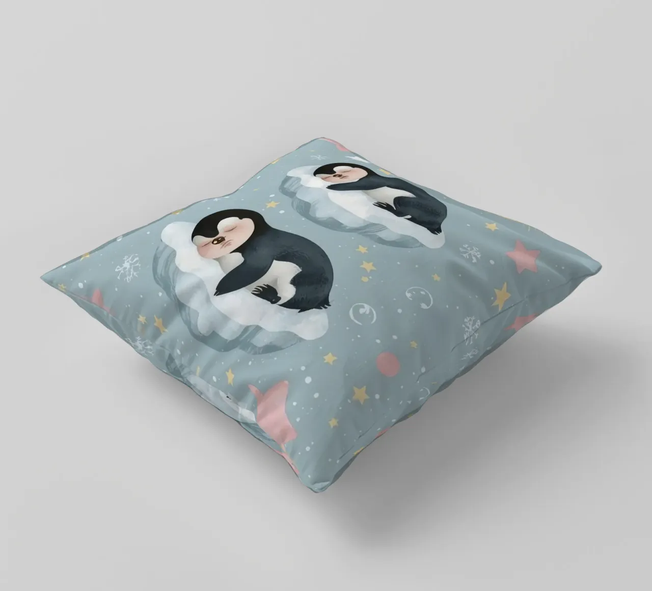 Due simpatici pinguini addormentati con elementi celestiali cuscino da DesignDoodle