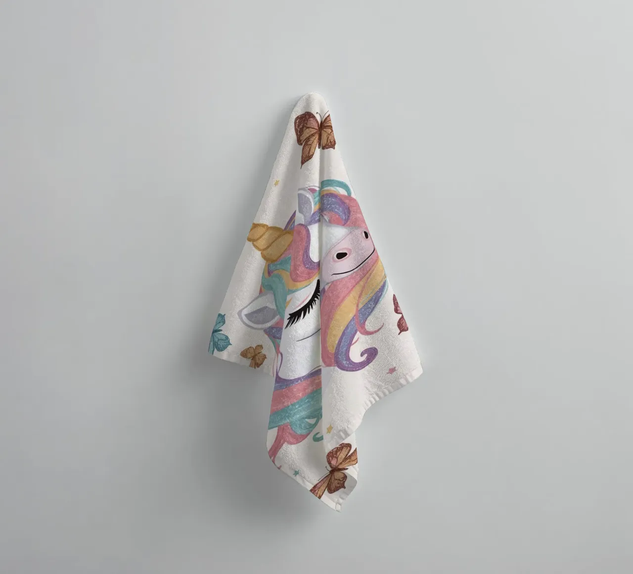 Unicorn with Rainbow Mane and Butterflies towel by DesignDoodle