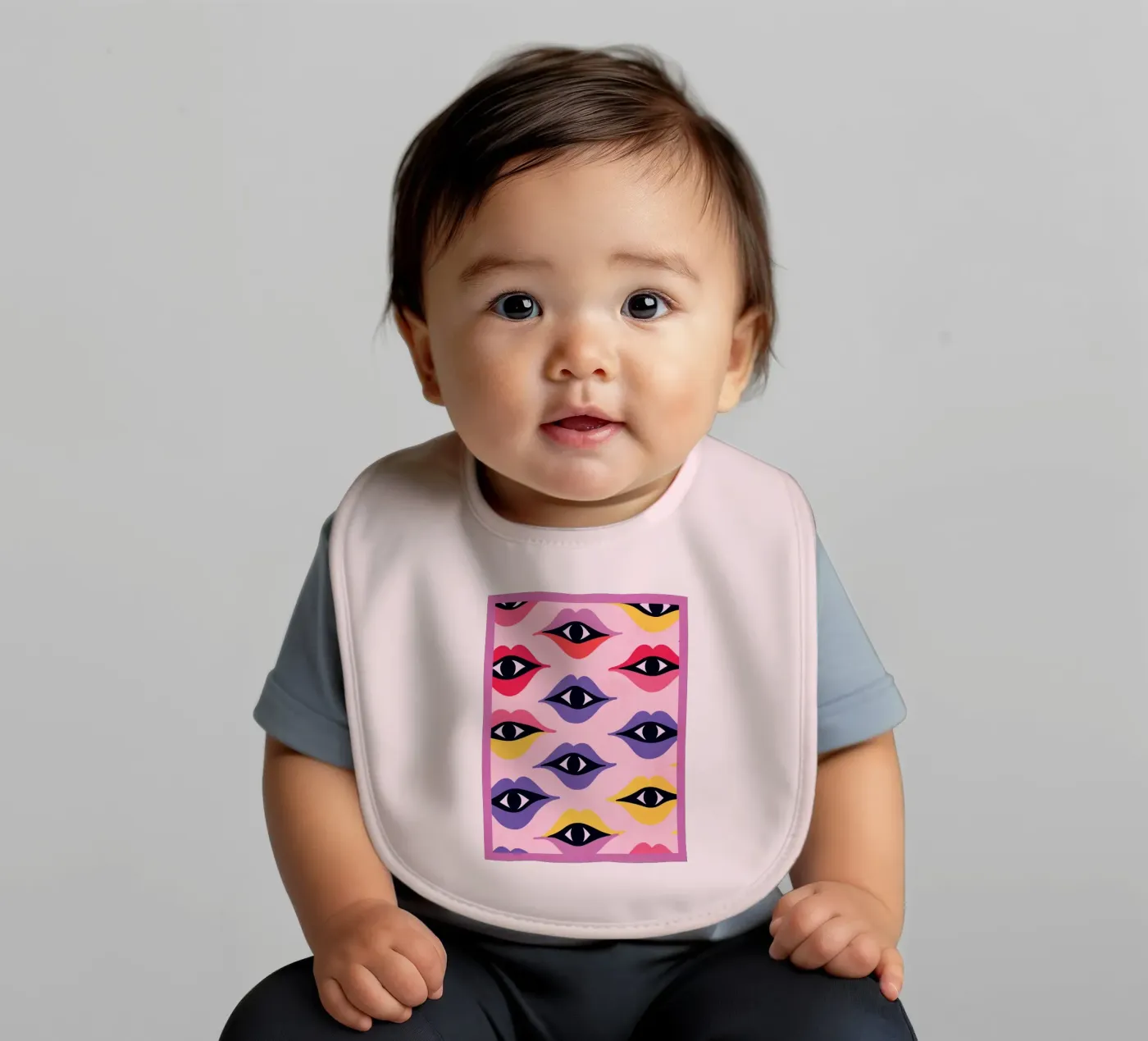 Eyes and Lips baby bib by Gaite