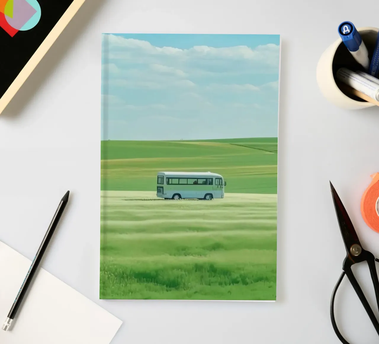 bus on field notebook by scoten