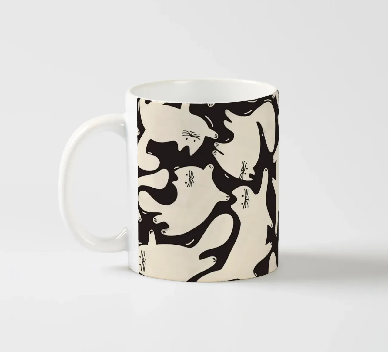 Tumbling Cats - Gattini neri e color crema tazza in ceramica da showmemars
