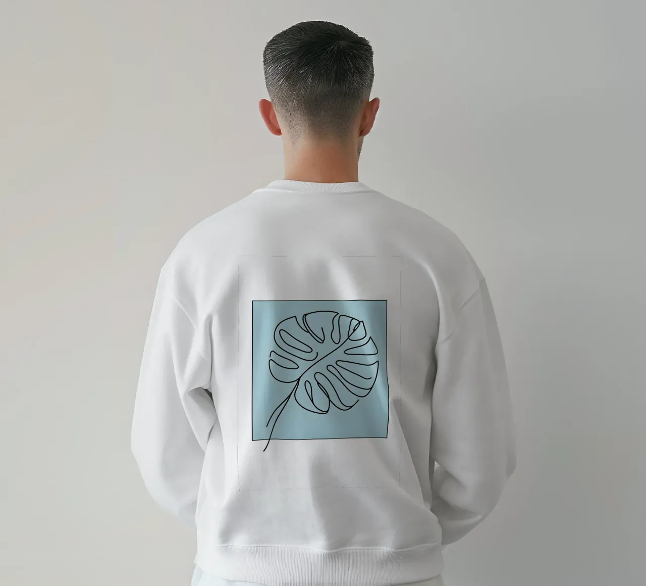 Disegno lineare minimalista di una foglia di Monstera felpa da Bloom And Brush
