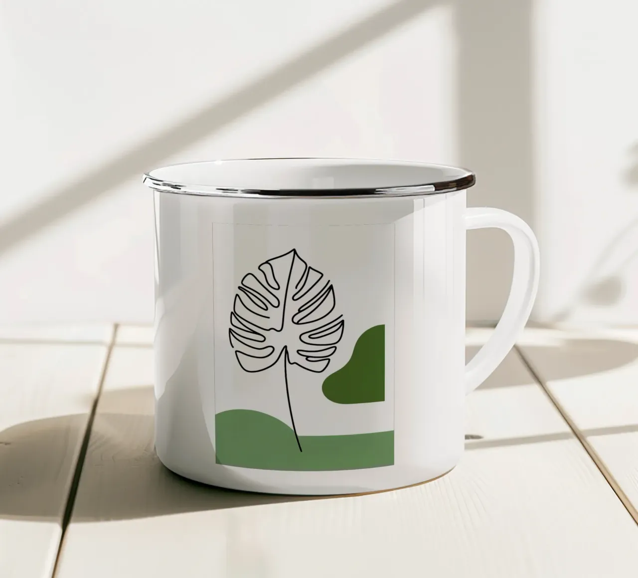 Disegno lineare minimalista di una foglia di Monstera tazza in smalto da Bloom And Brush