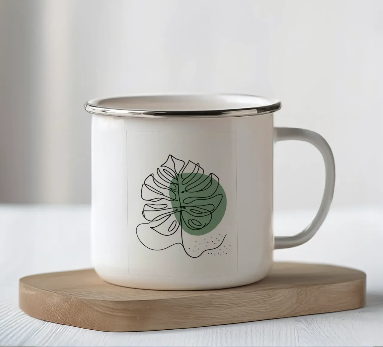 Disegno lineare minimalista di una foglia di Monstera tazza in smalto da Bloom And Brush