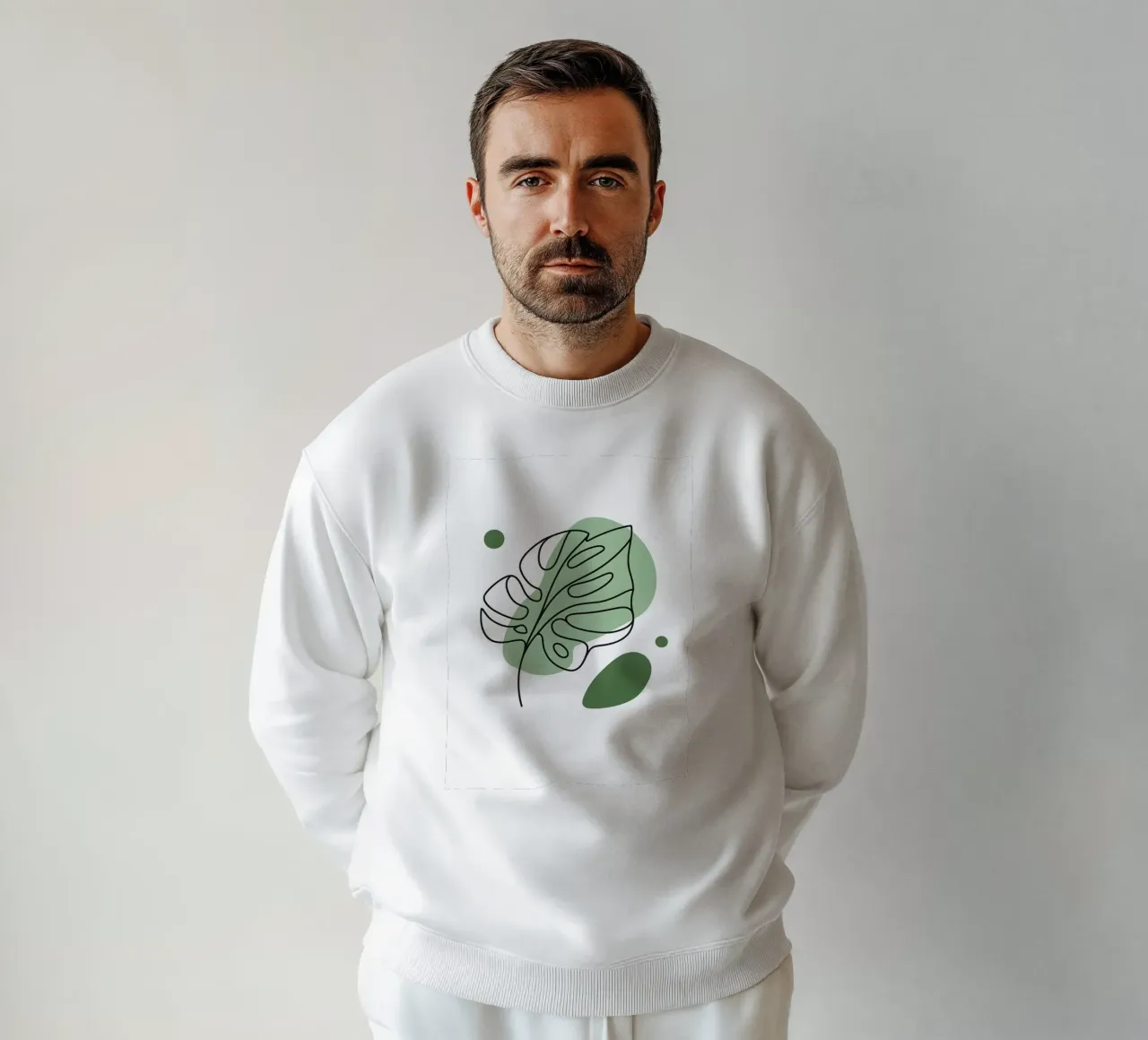 Disegno lineare minimalista di una foglia di Monstera felpa da Bloom And Brush