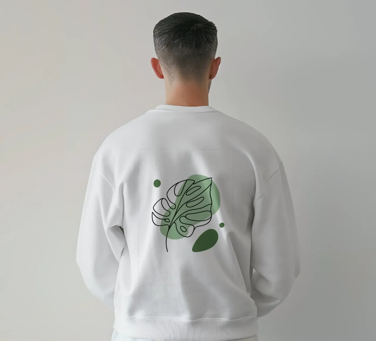 Disegno lineare minimalista di una foglia di Monstera felpa da Bloom And Brush