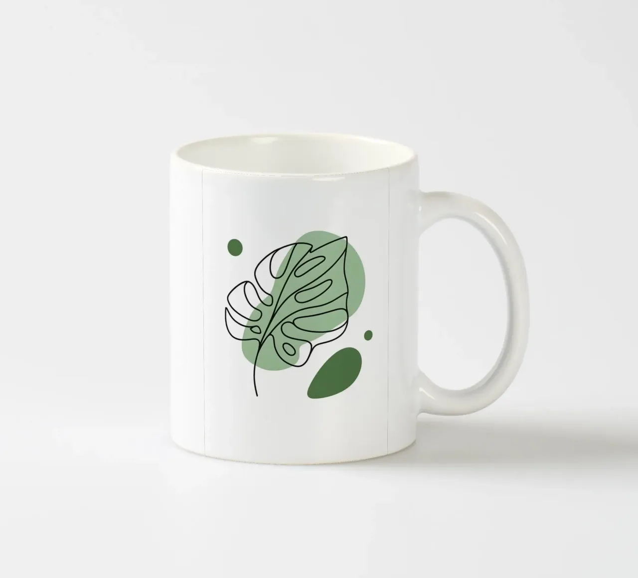 Disegno lineare minimalista di una foglia di Monstera tazza in ceramica da Bloom And Brush