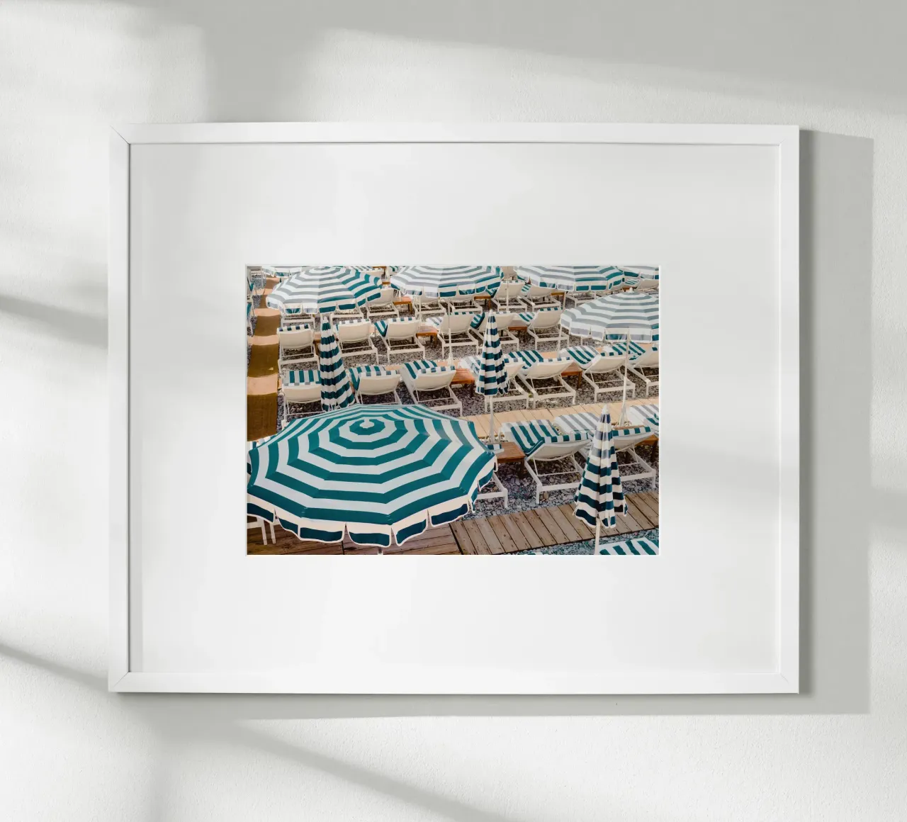 Riviera Striped Blue and White Umbrellas poster con telaio in plastica da GraceDigitalArtCo
