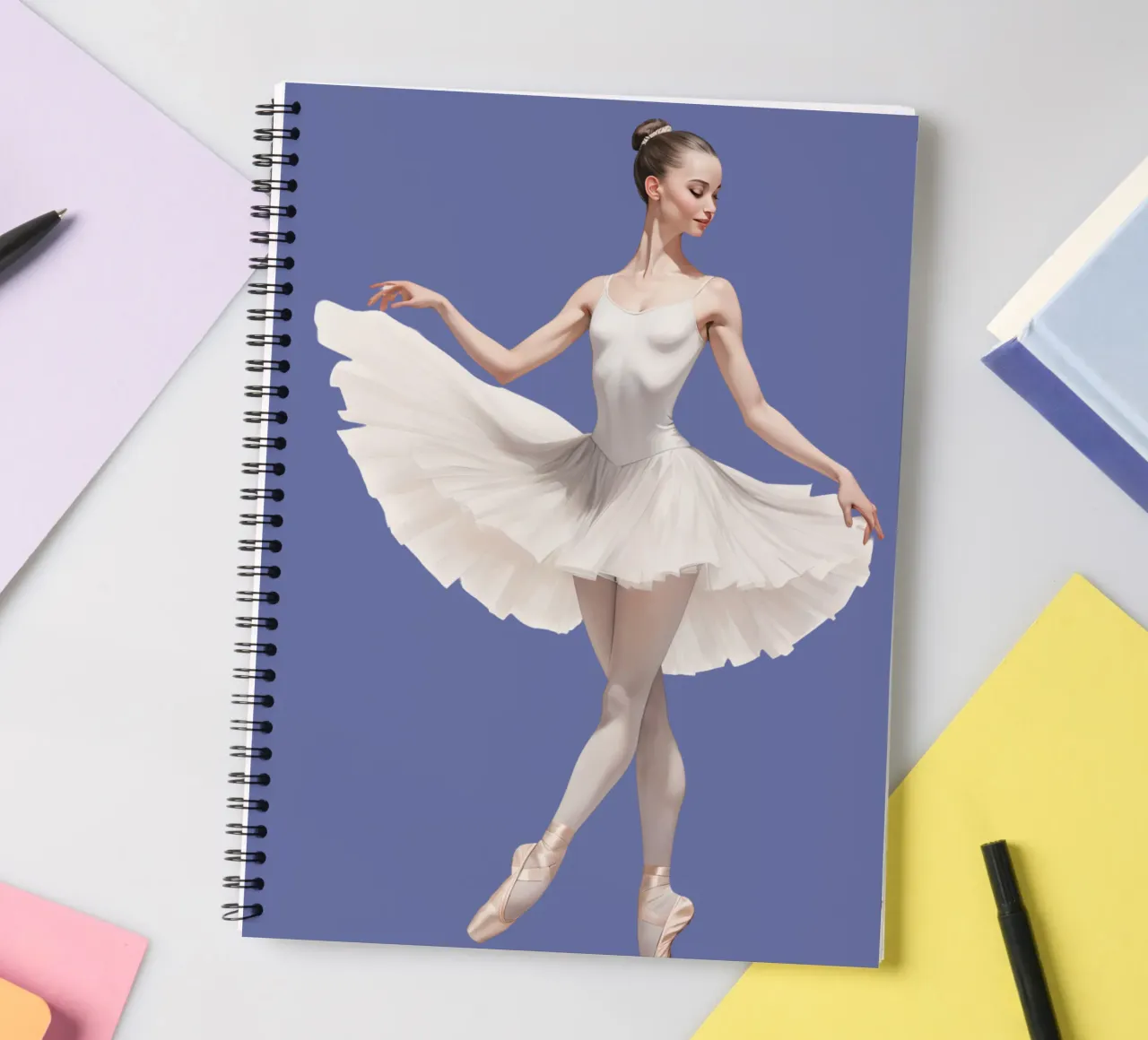Ballerina in white tutu and leotard on pointe spiral notebook by DesignDoodle