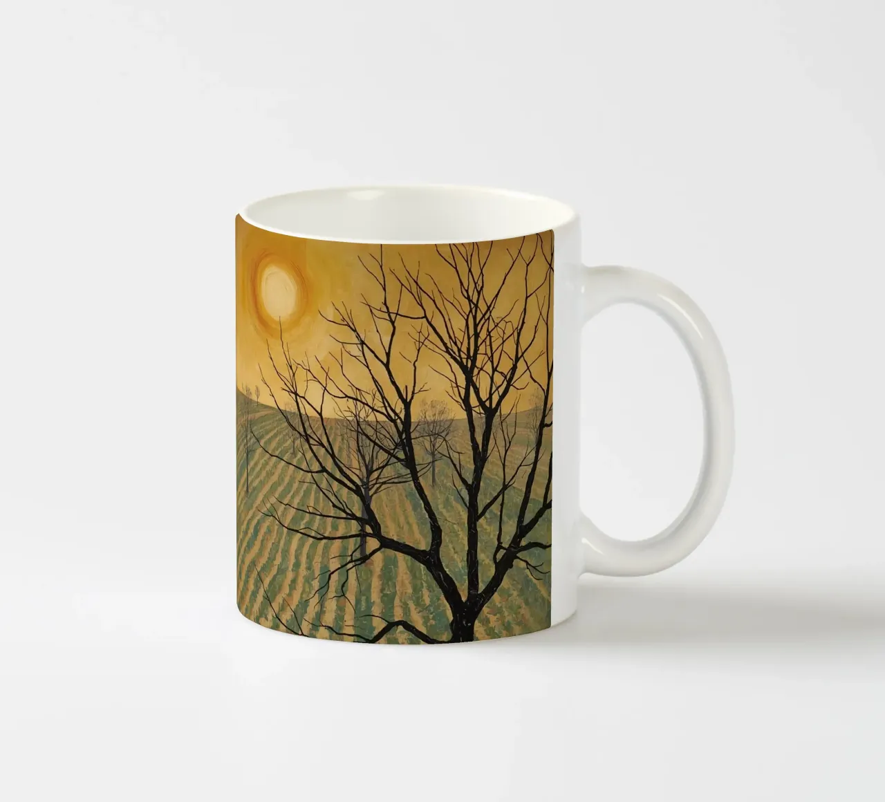 Albero spoglio in campo coltivato sotto un cielo dorato tazza in ceramica da DesignDoodle
