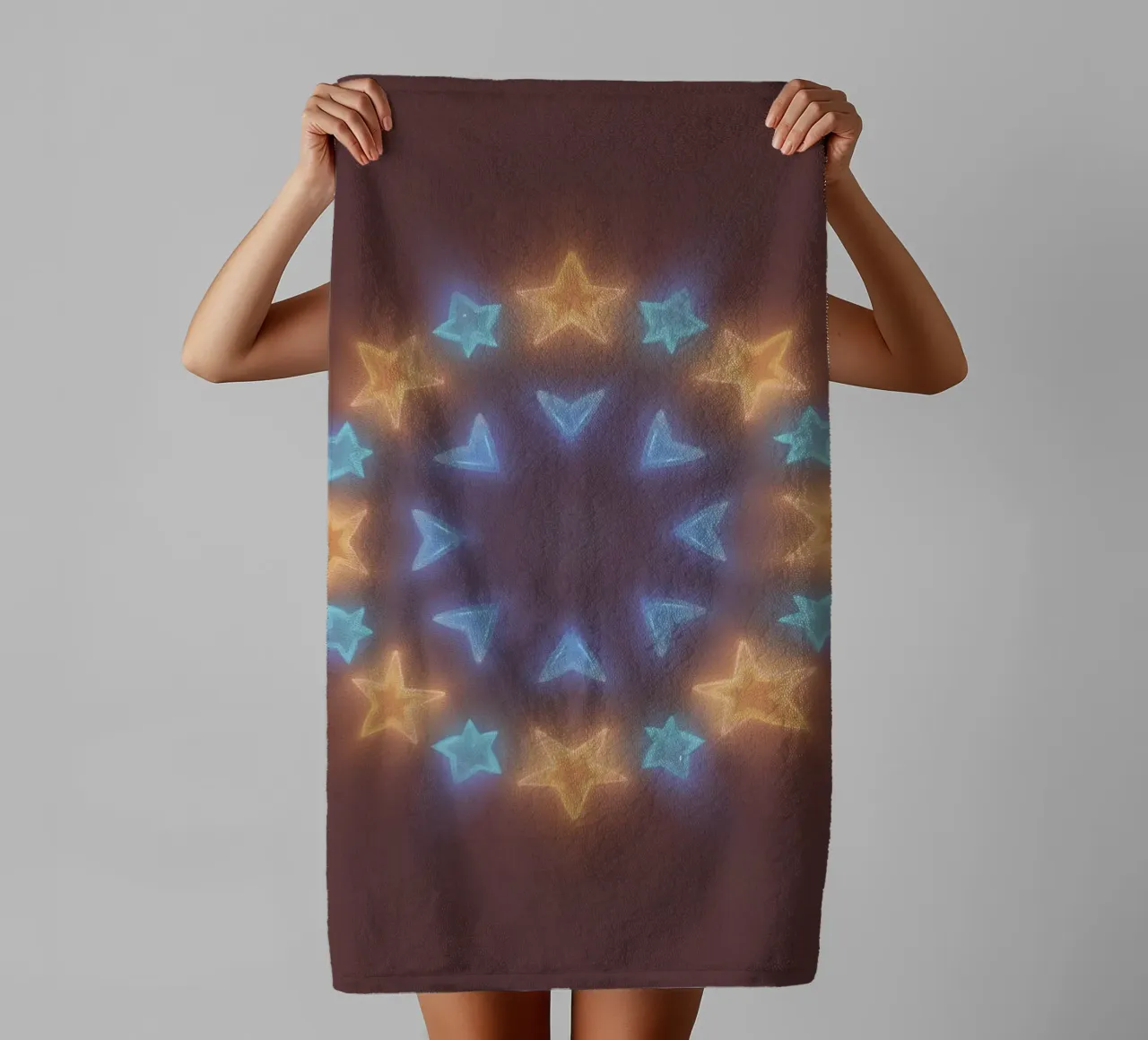 Circular arrangement of glowing stars and chevrons towel by DesignDoodle