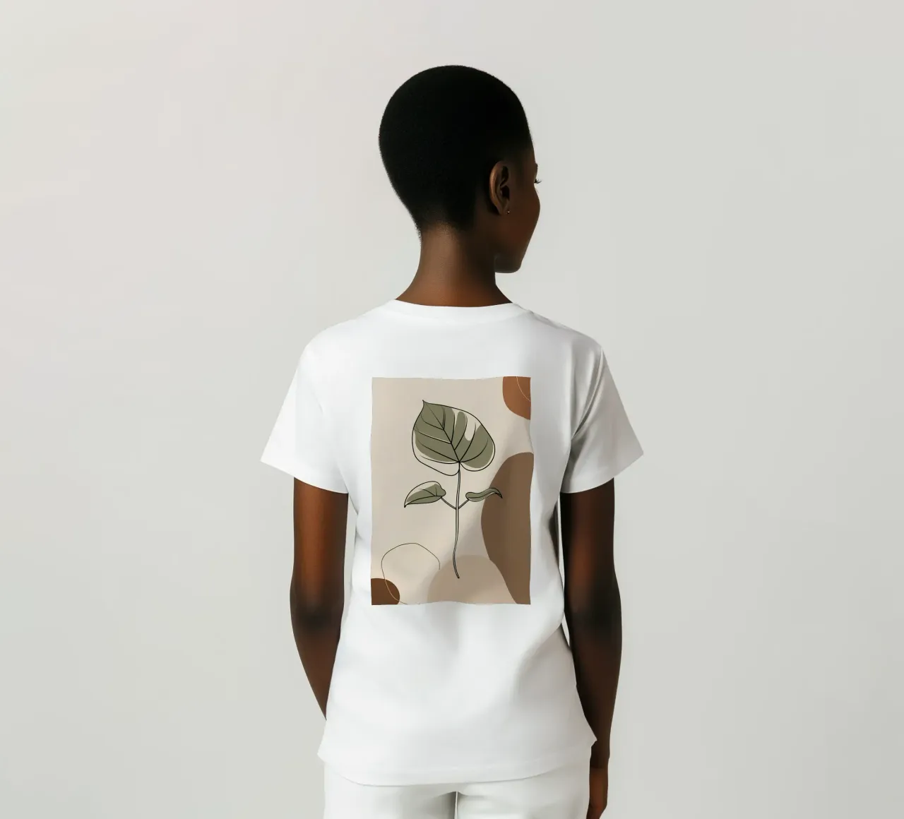 Disegno minimalista a una linea di una singola foglia di filodendro t-shirt da Bloom And Brush